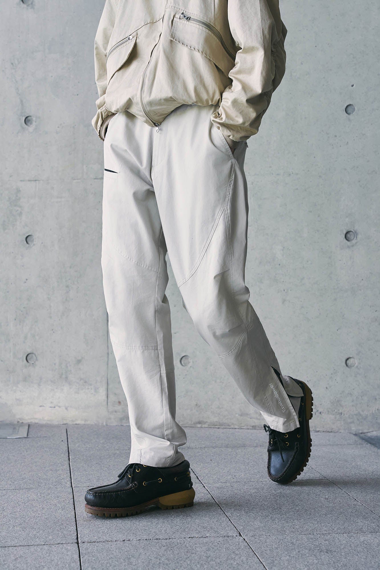 ENSHADOWER Spliced Crinkled Zippered Jogger Pants White