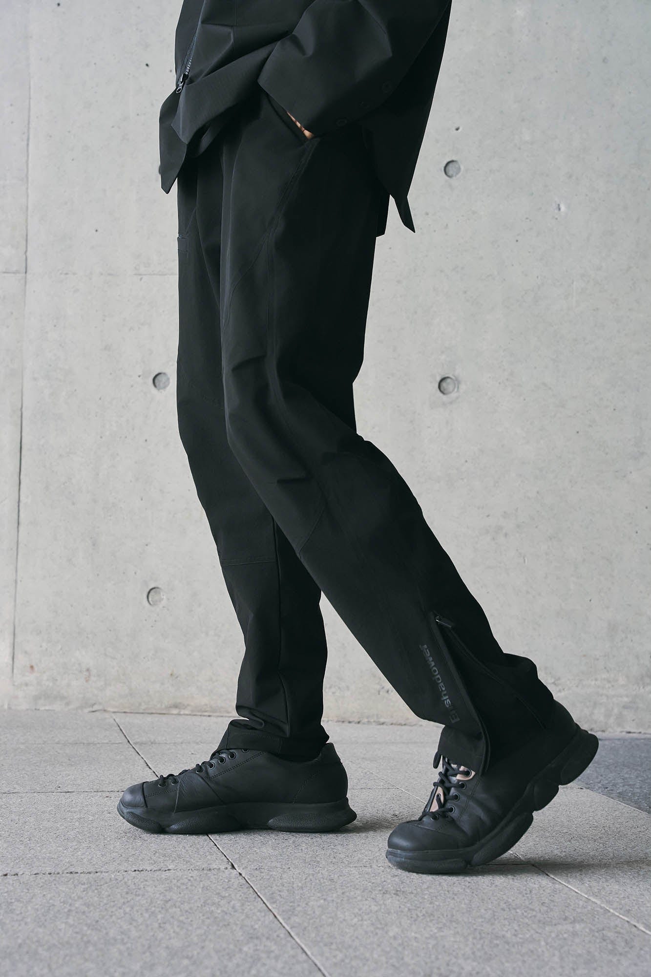 ENSHADOWER Spliced Crinkled Zippered Jogger Pants Black