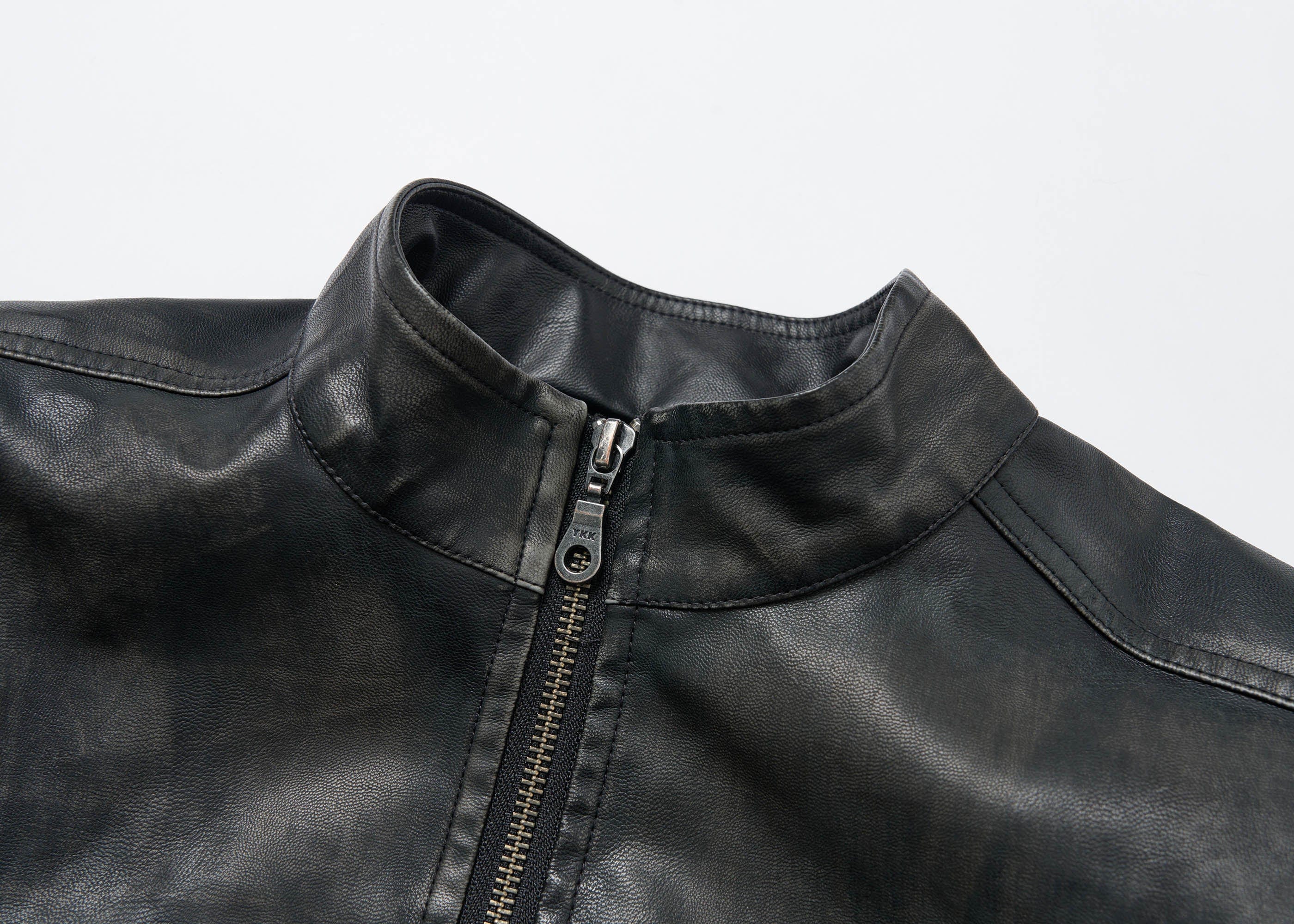 SAVAGEGROWTHWORLD Crossed Spliced Rivet Faux Leather Jacket