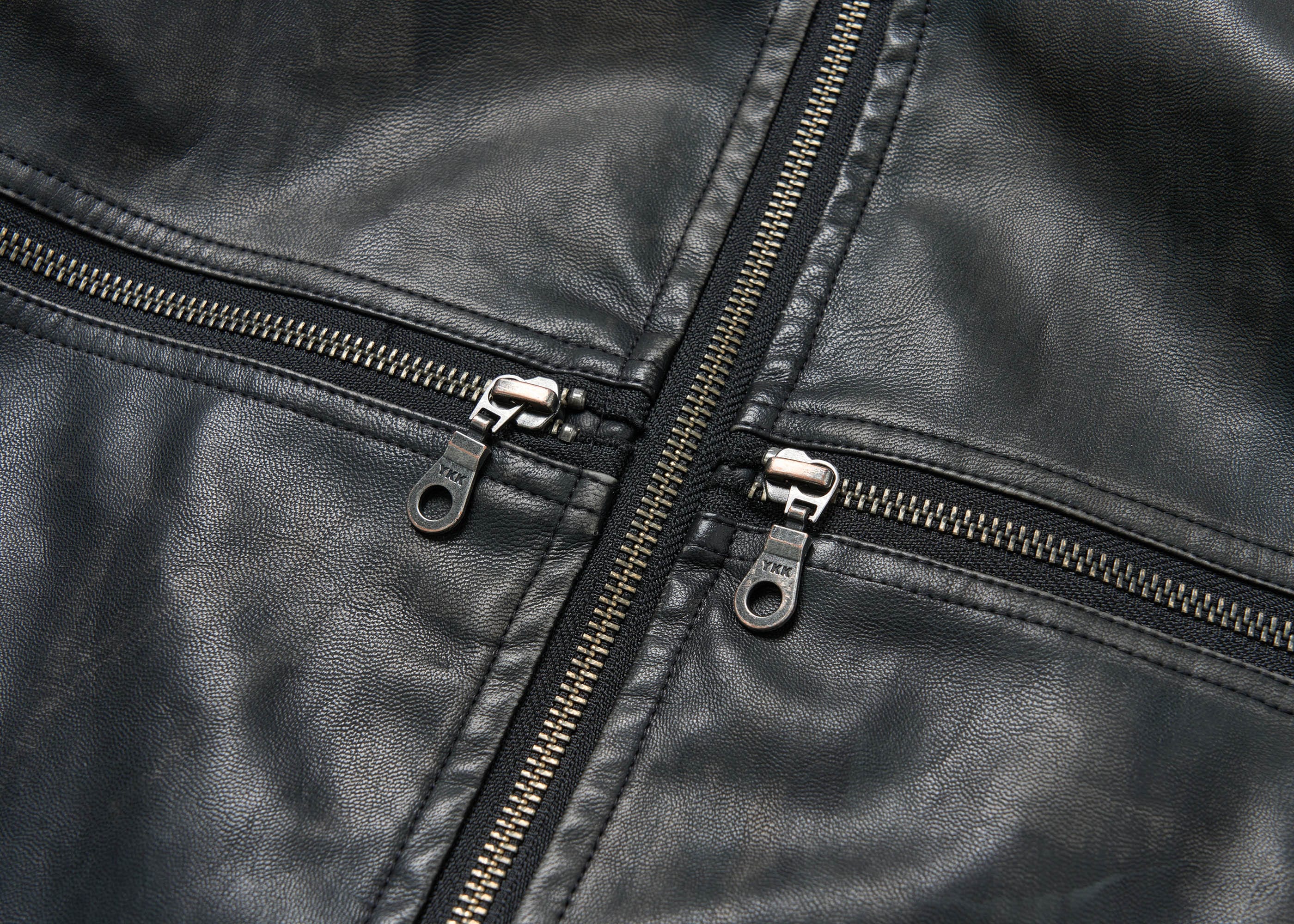 SAVAGEGROWTHWORLD Crossed Spliced Rivet Faux Leather Jacket