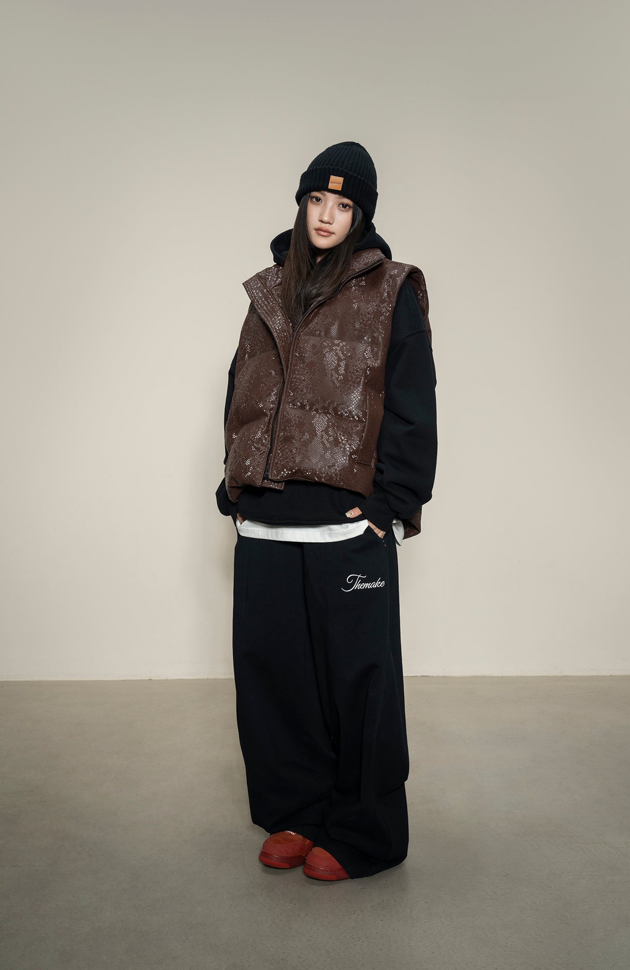 MAKEMORE Scale-Textured PU Embroidered Puffer Vest