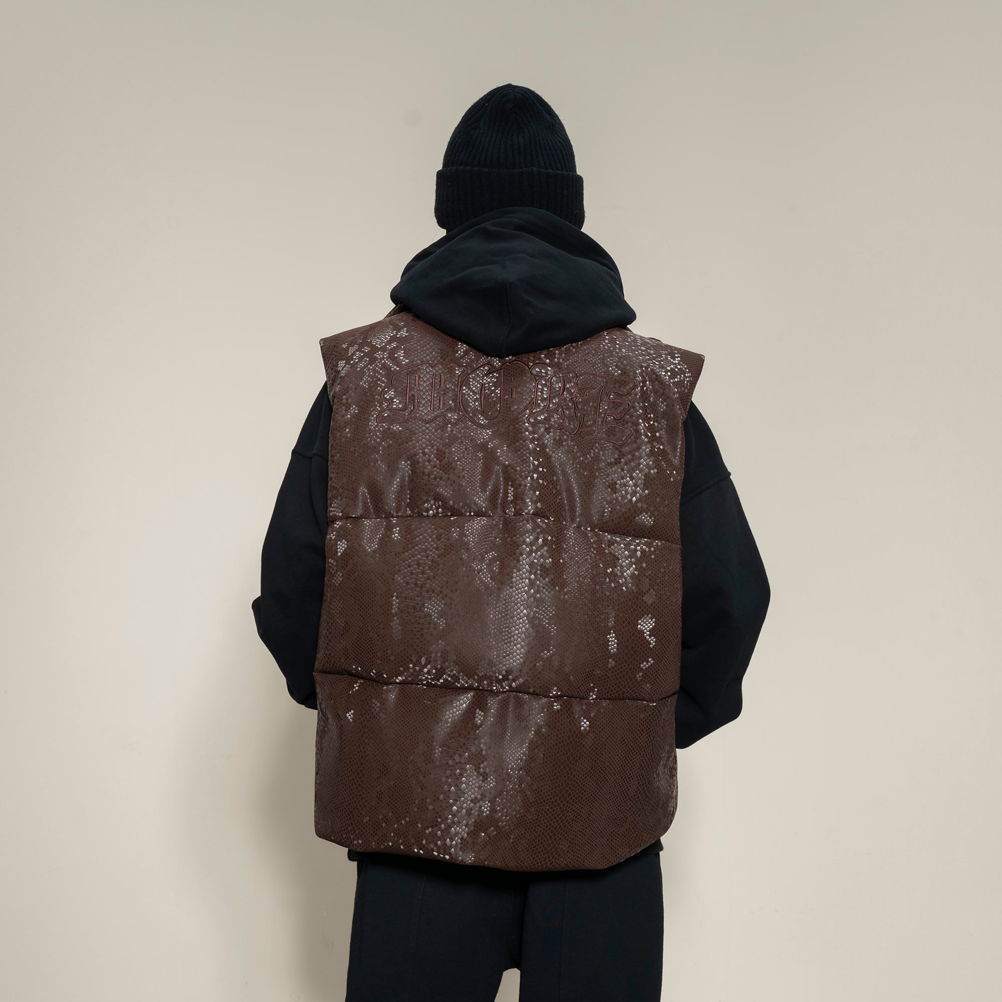 MAKEMORE Scale-Textured PU Embroidered Puffer Vest