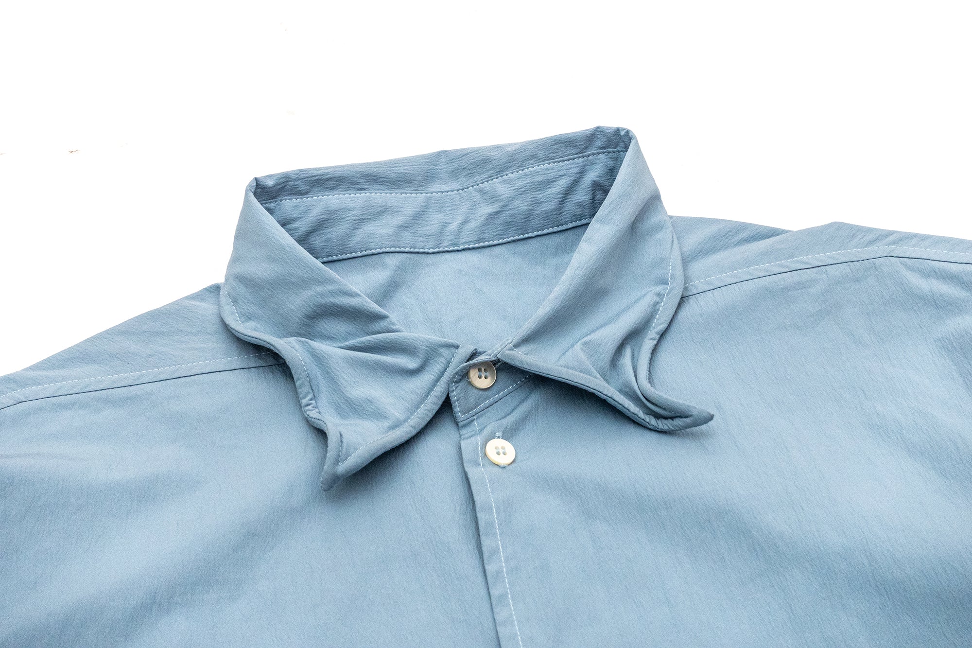 IN EXISTENCE Wired Formable Edge Layered Hem Shirt