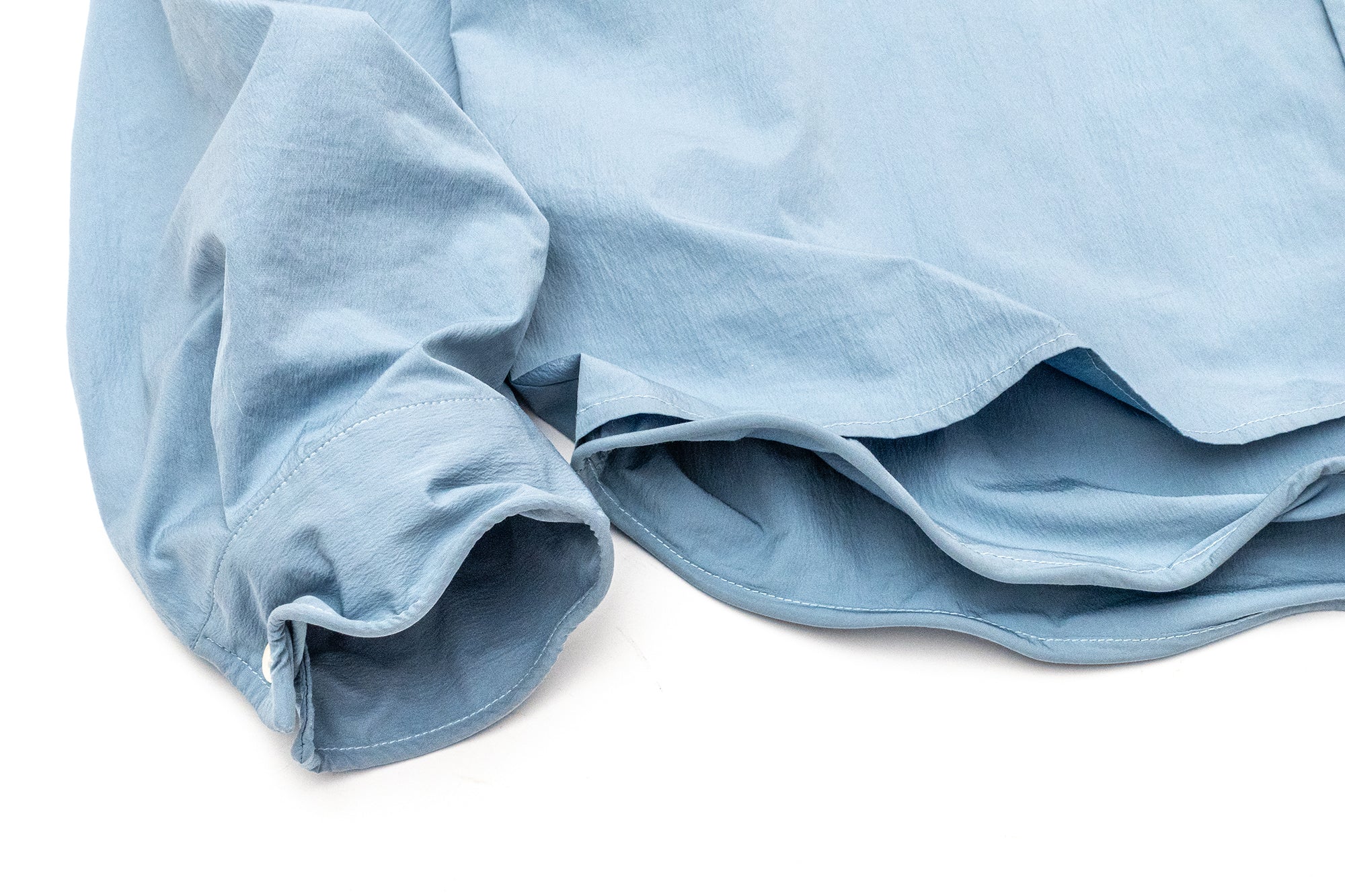 IN EXISTENCE Wired Formable Edge Layered Hem Shirt