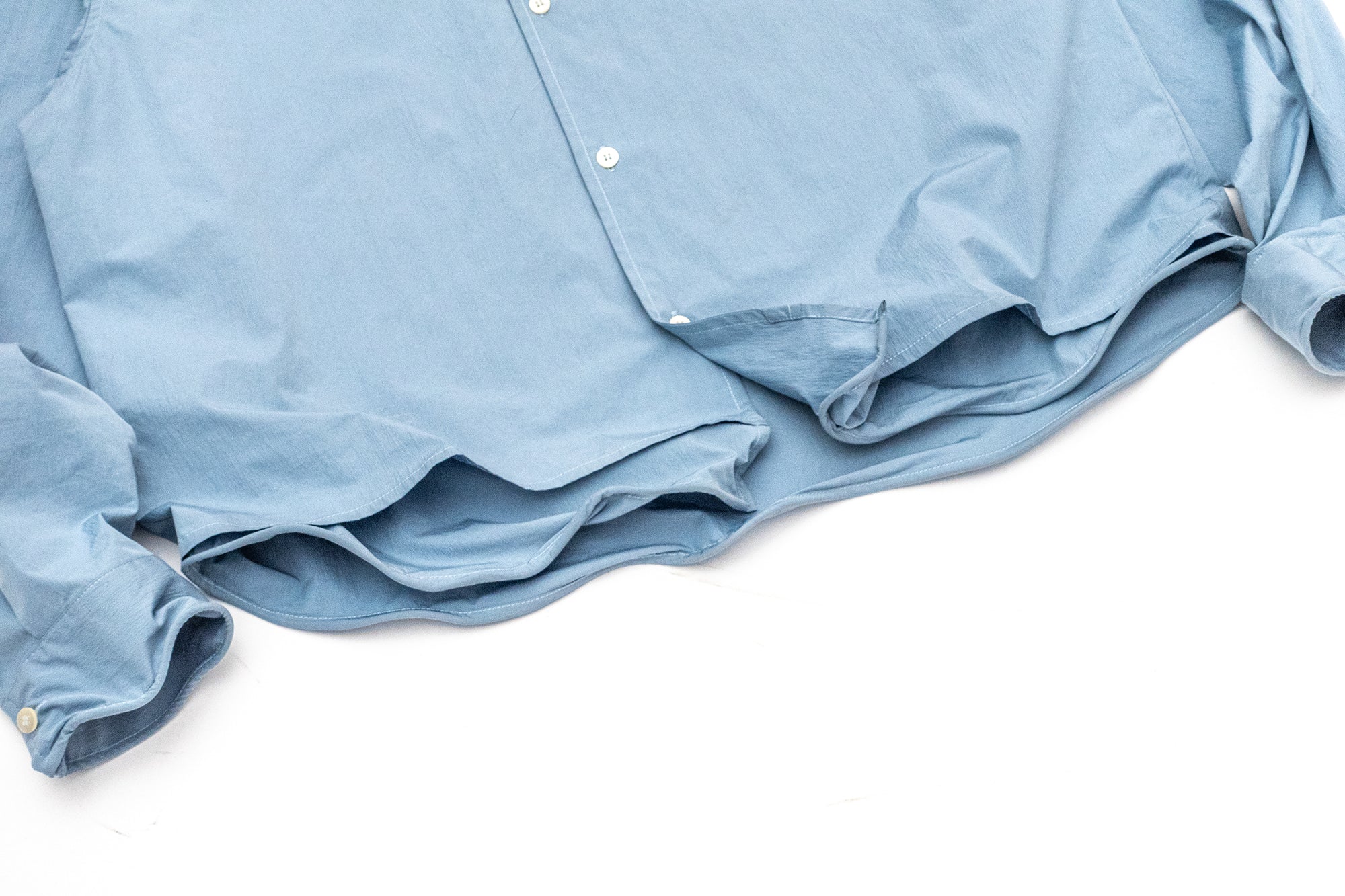 IN EXISTENCE Wired Formable Edge Layered Hem Shirt