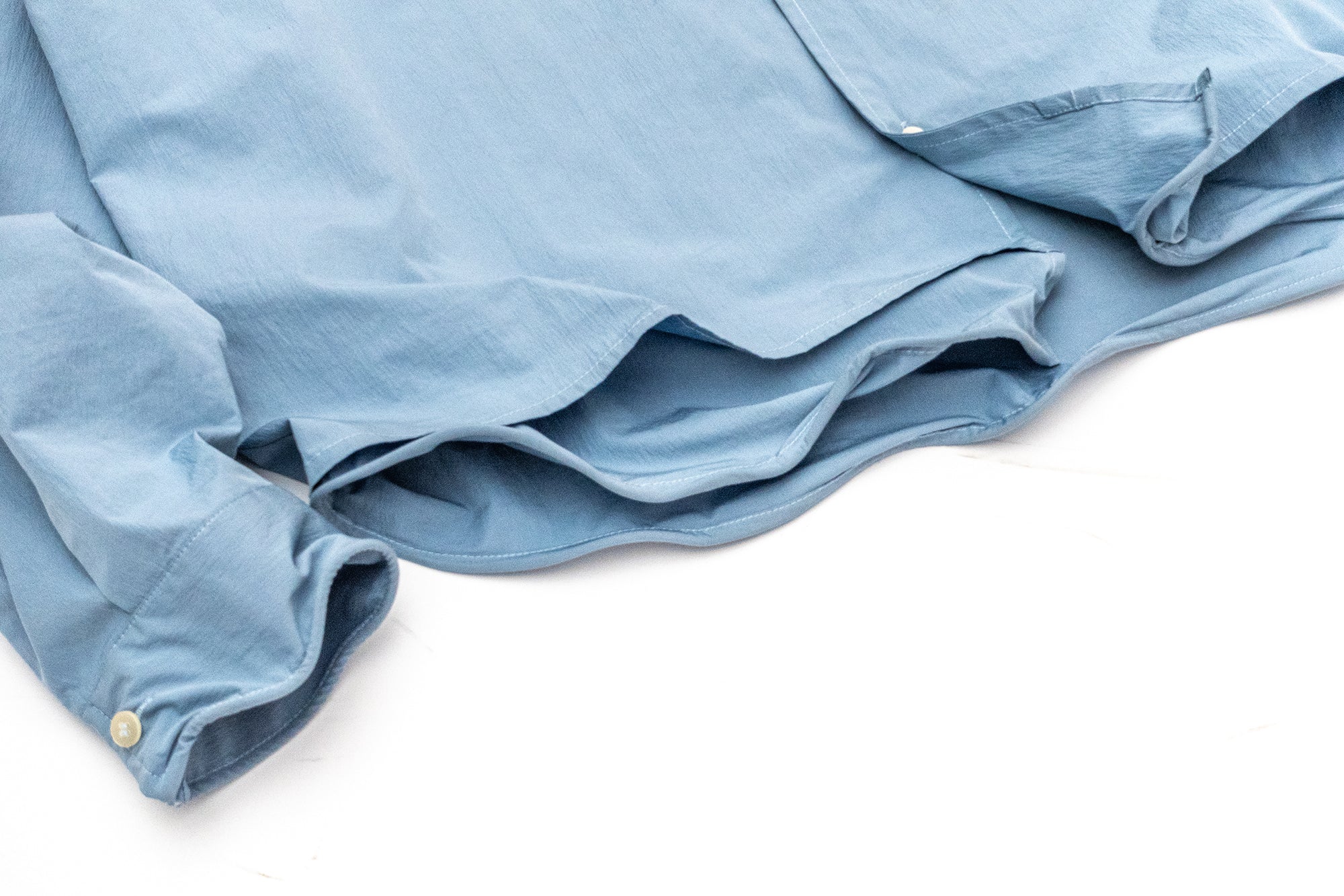 IN EXISTENCE Wired Formable Edge Layered Hem Shirt