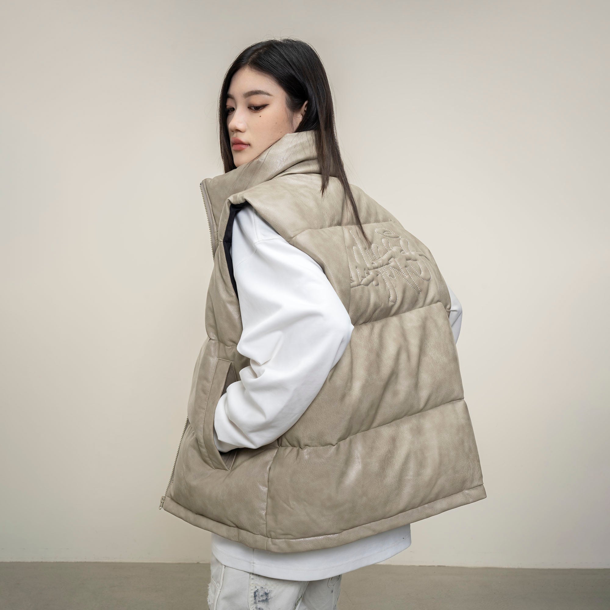 MAKEMORE PU Embossed LOGO Puffer Vest