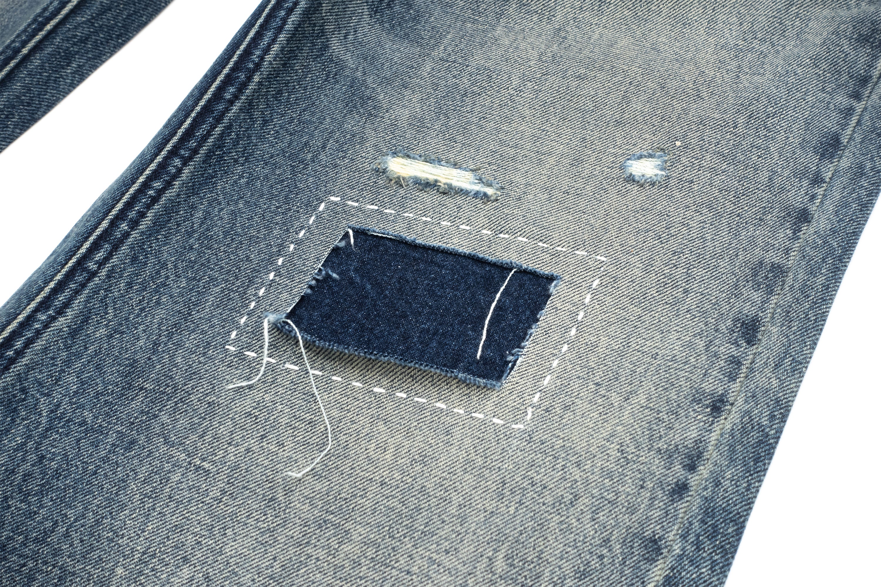 IN EXISTENCE Distressed Stitched Patch Flared Jeans