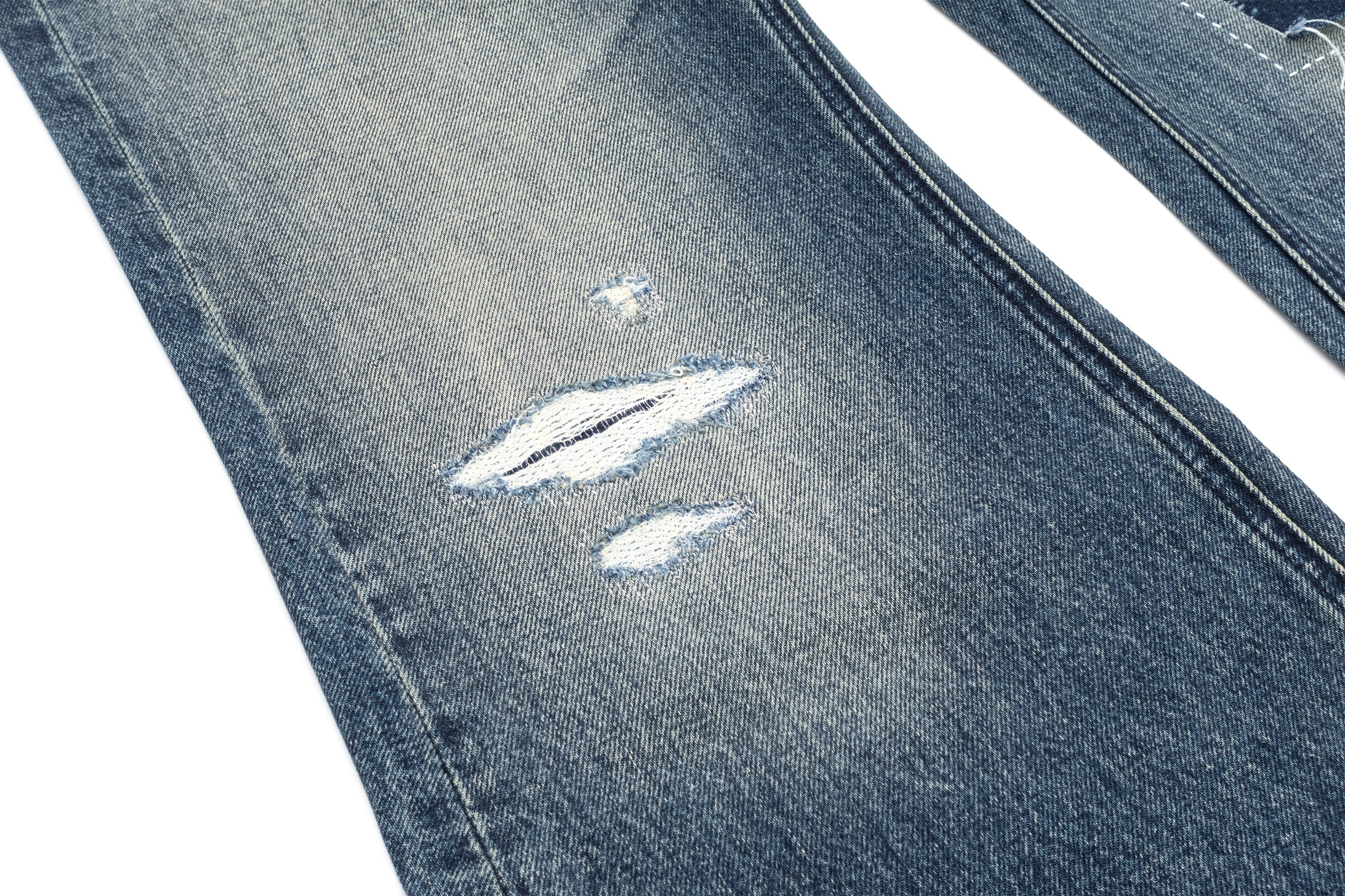 IN EXISTENCE Distressed Stitched Patch Flared Jeans