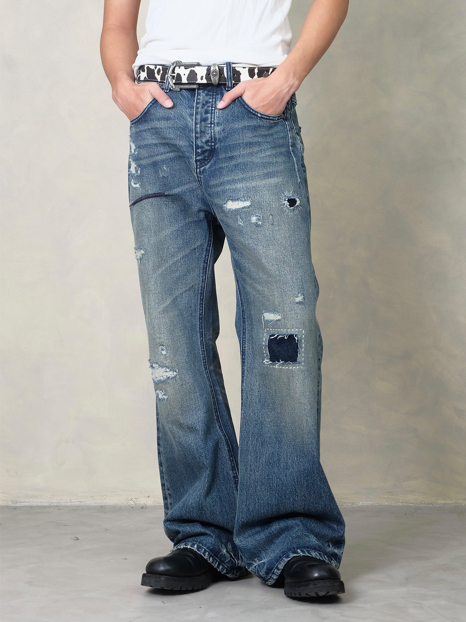 IN EXISTENCE Distressed Stitched Patch Flared Jeans