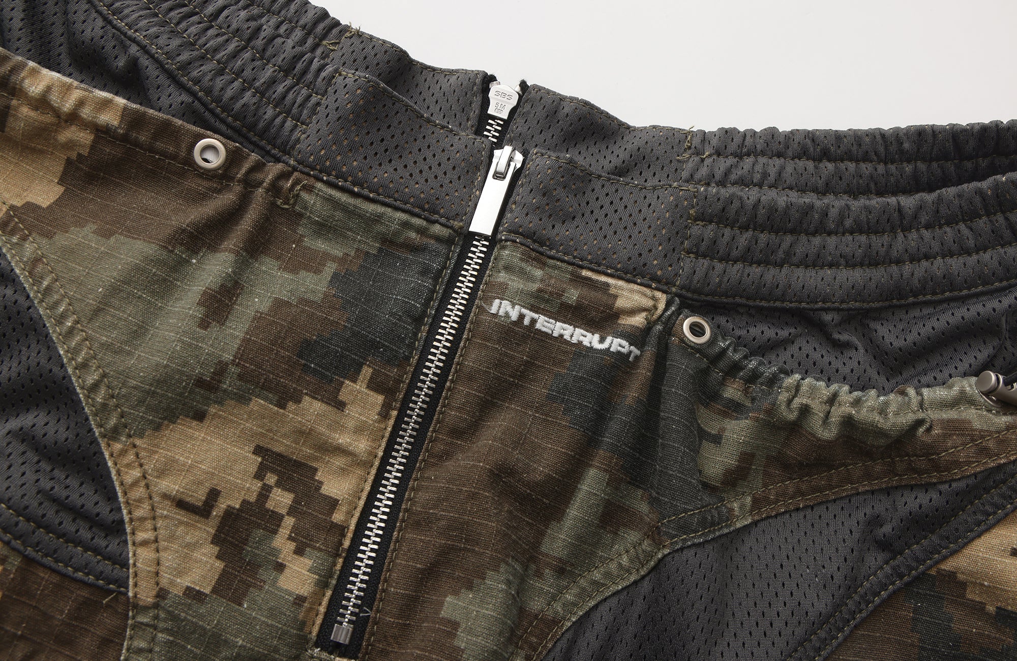 INTERRUPT Camo Back Zip Double-Layer Pants