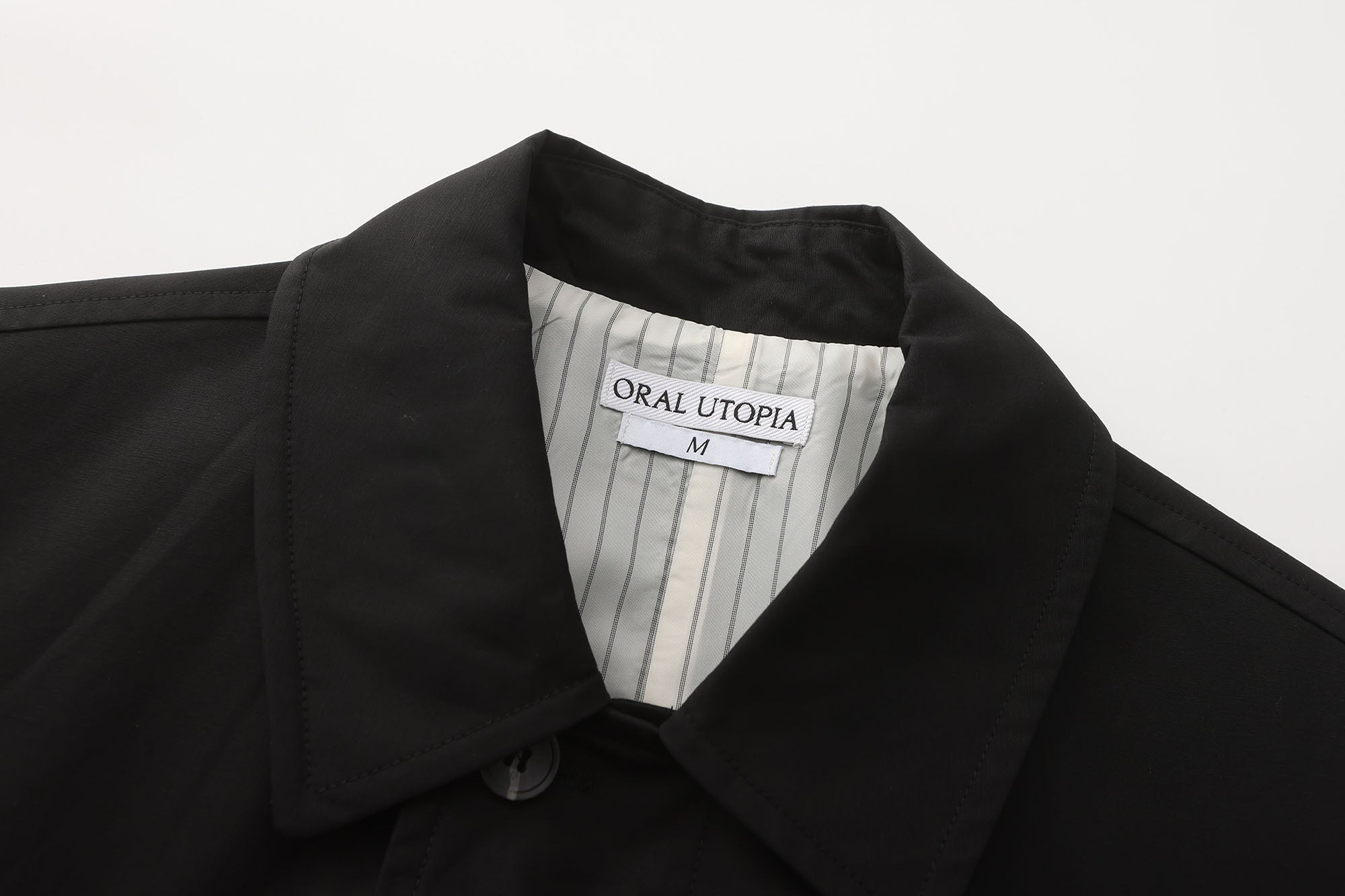 ORAL UTOPIA Faux Layered Hem Multi-Pocket Coat