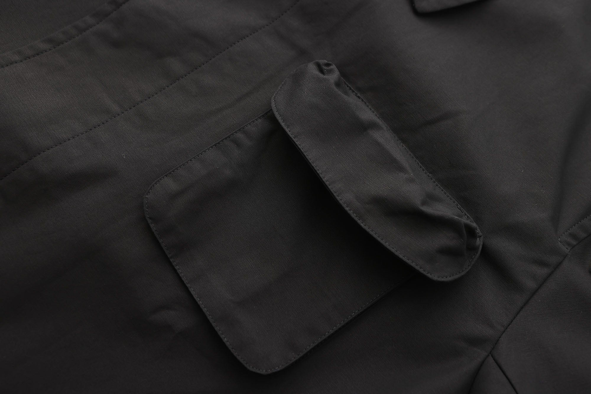 ORAL UTOPIA Faux Layered Hem Multi-Pocket Coat
