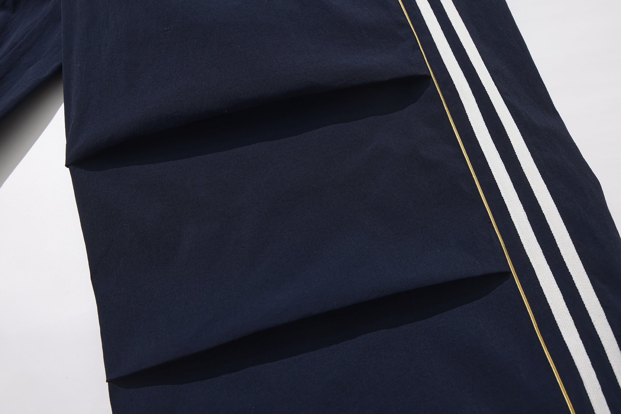 UMAMIISM Striped Quick-Dry Track Pants, premium urban and streetwear designers apparel on PROJECTISR.com, UMAMIISM