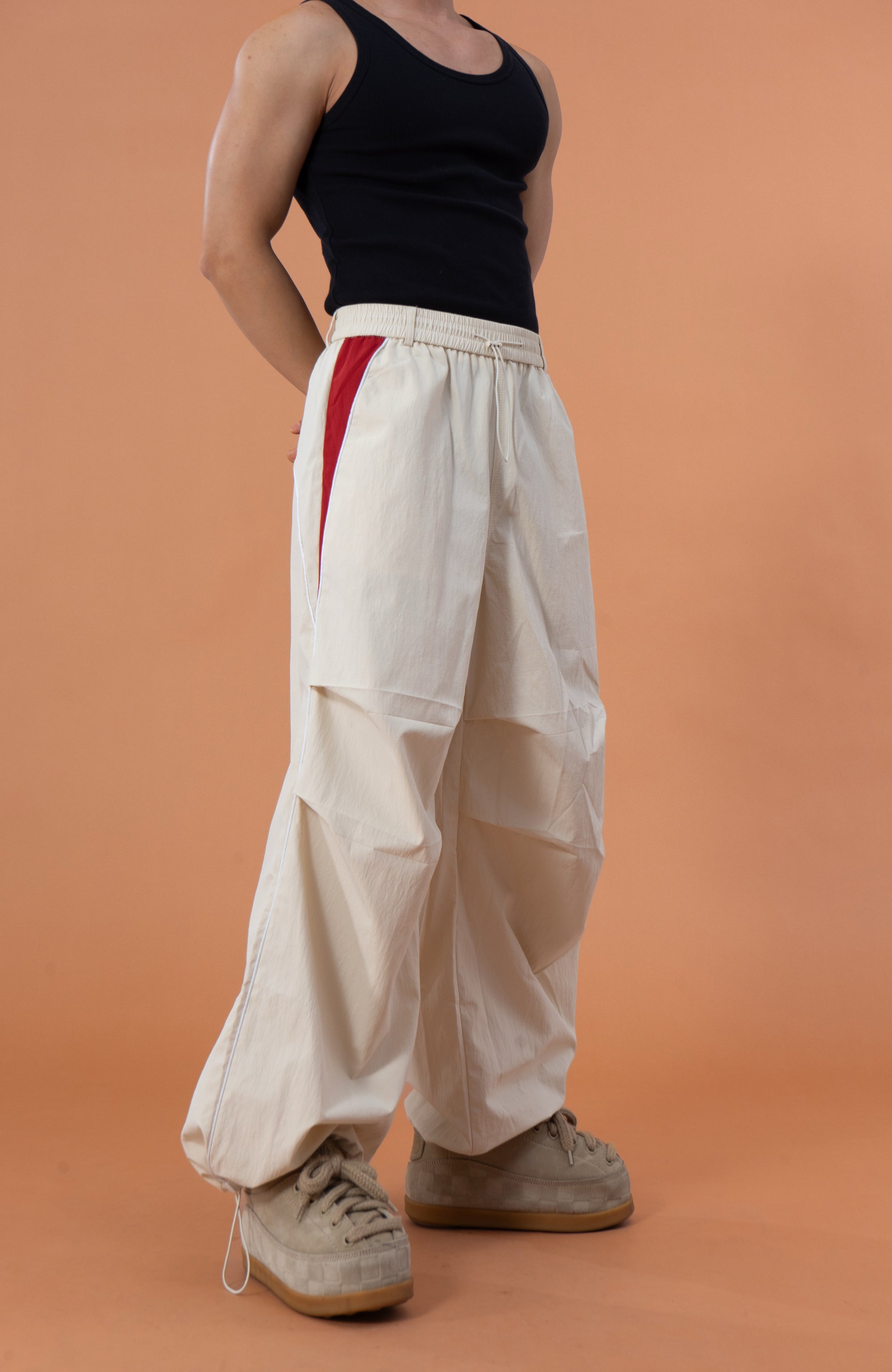 CLP Contrast Panel Pleated-Knee Drawstring-Hem Pants