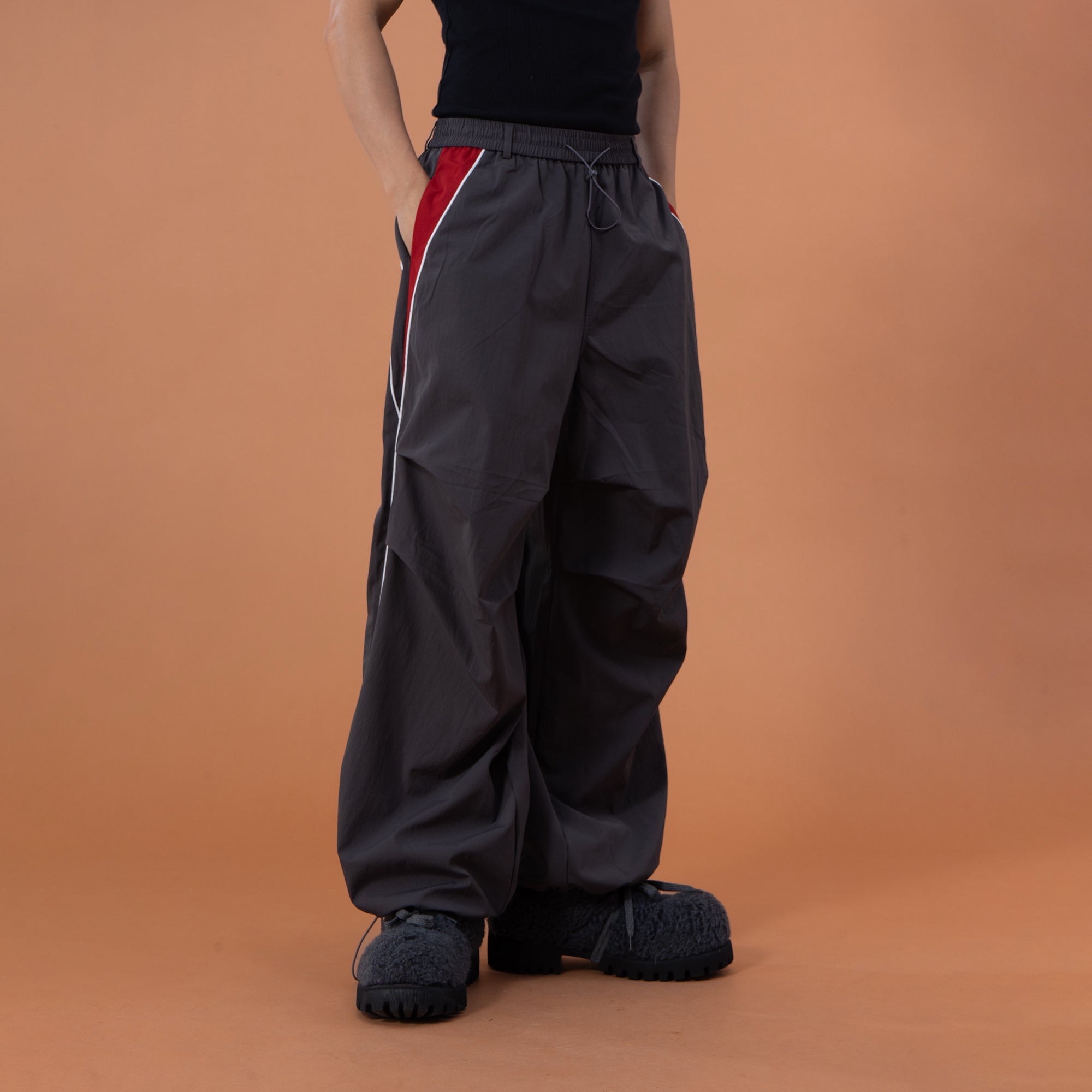 CLP Contrast Panel Pleated-Knee Drawstring-Hem Pants