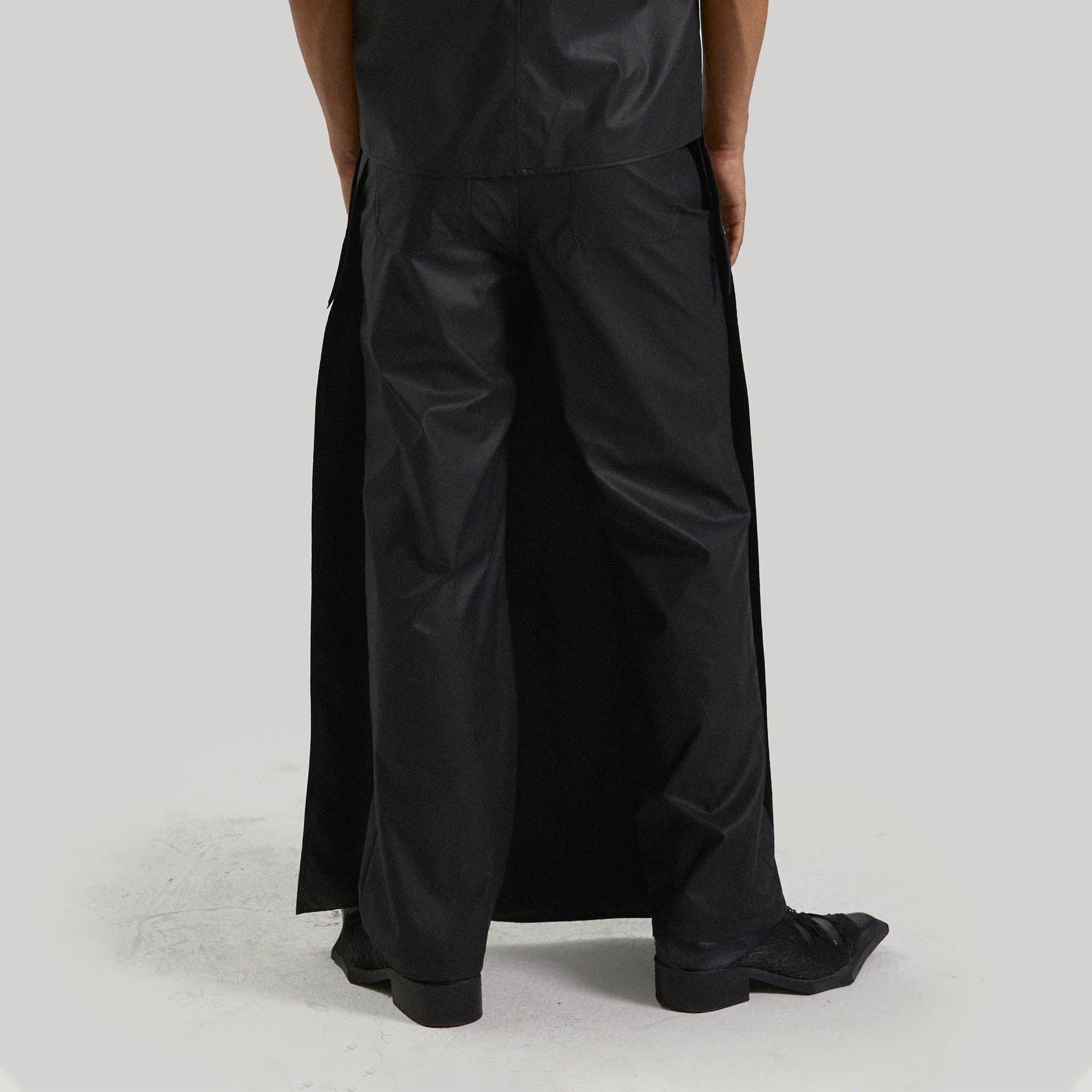 KADAKADA Detachable Cloak Faux Leather Pants