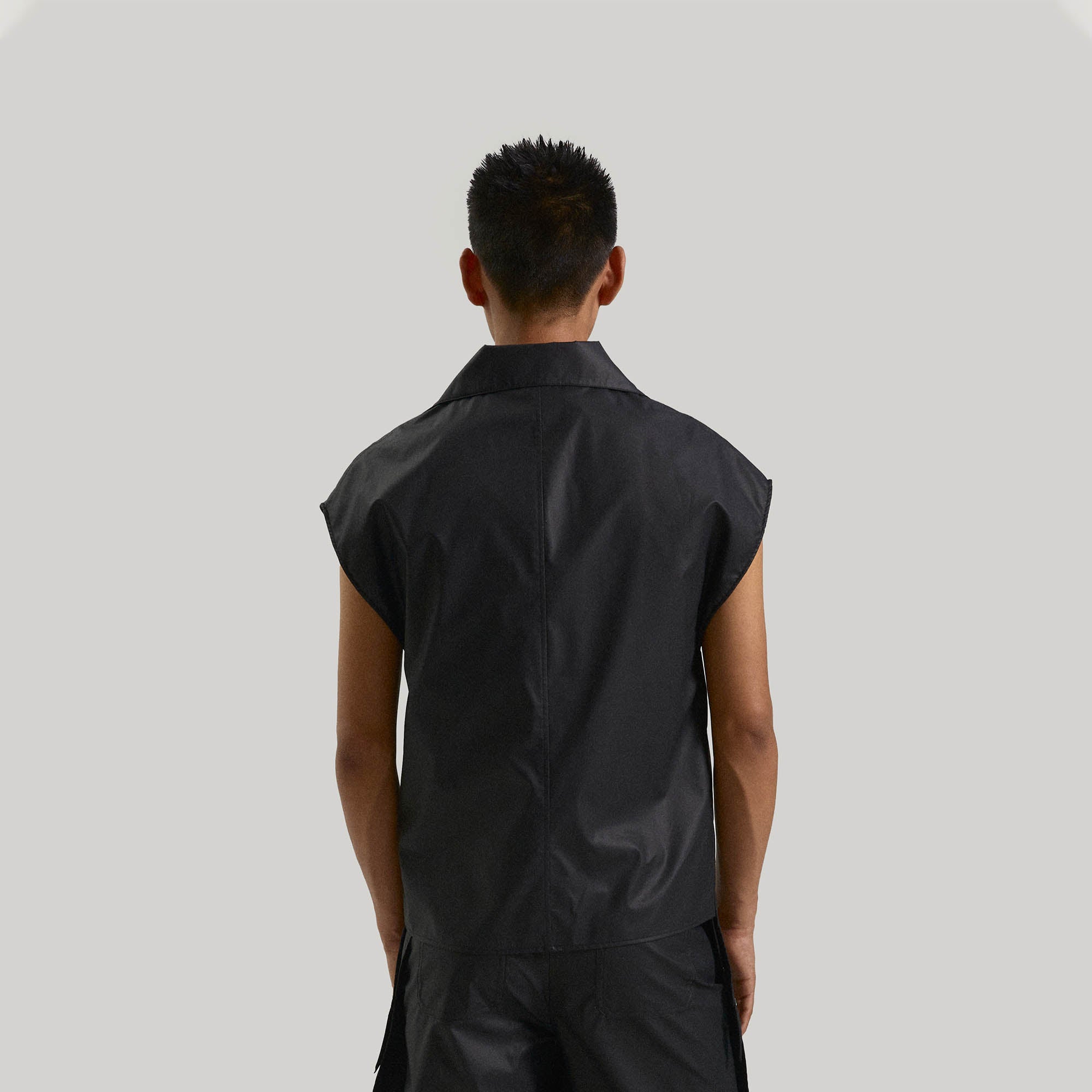 KADAKADA Pointed Hem Faux Leather Vest