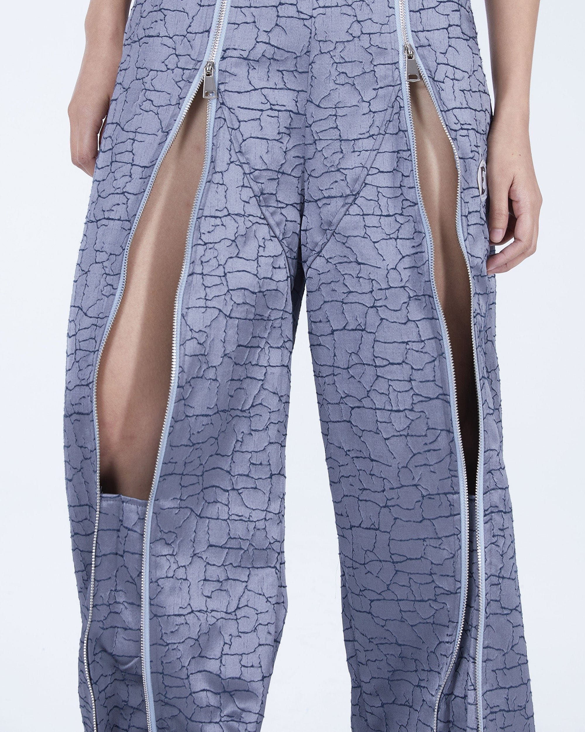 EMBRYO Deconstructed Front-Zipper Cracked Flared Pants