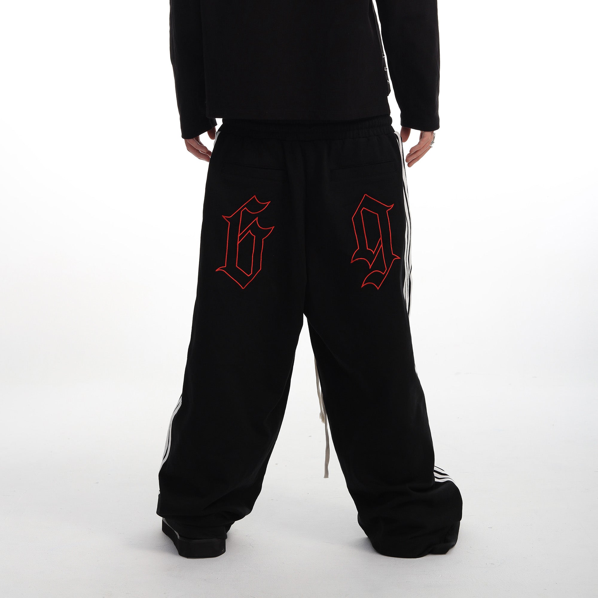 SEXXDEVIL Striped Embroidered Paint-Splattered Sweatpants