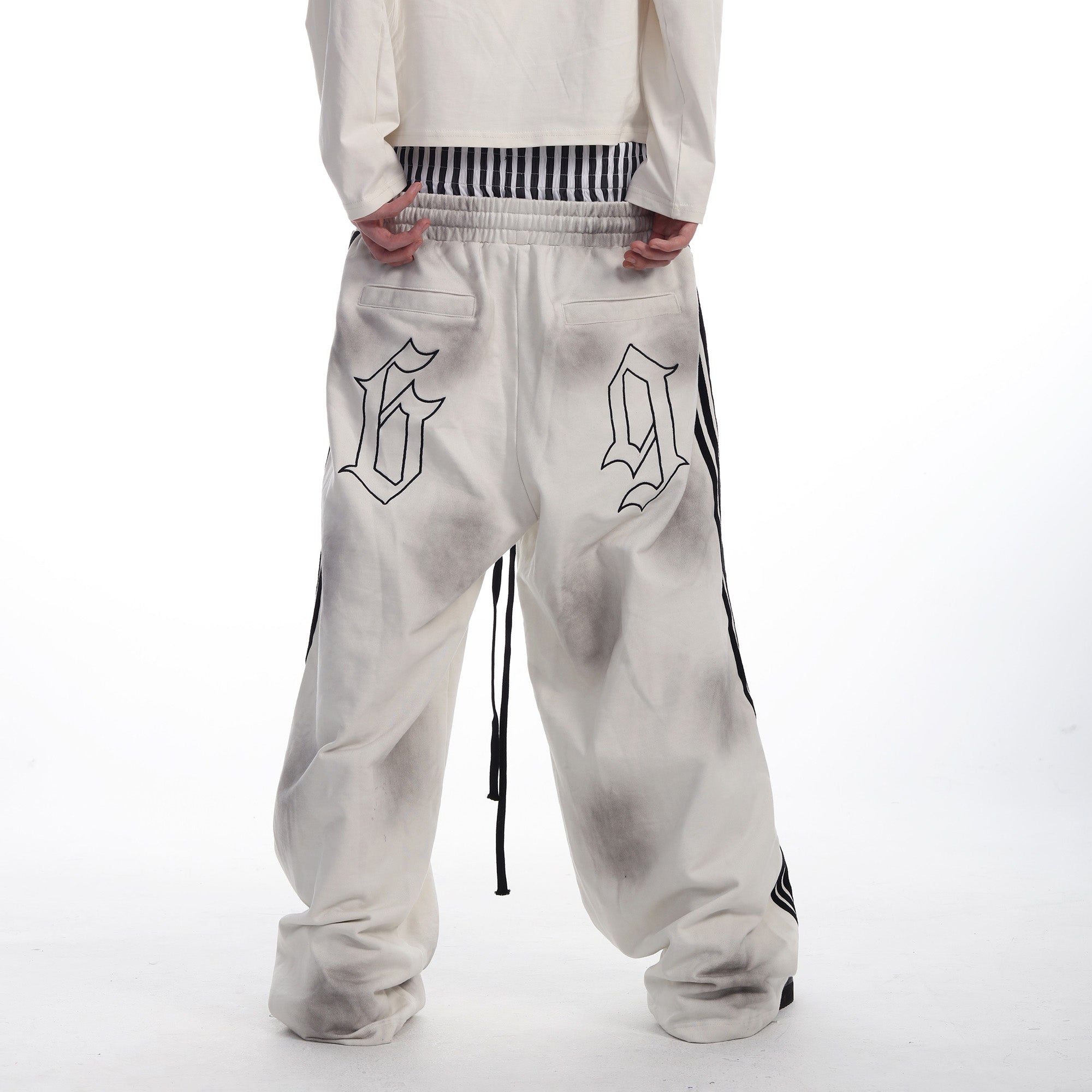 SEXXDEVIL Striped Embroidered Paint-Splattered Sweatpants