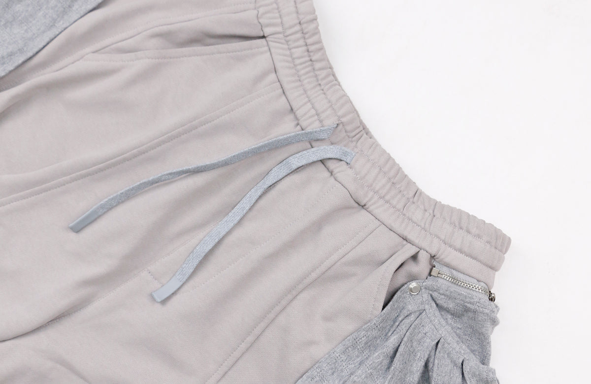 RELABEL Deconstructed Pleated Wide-Leg Sweatpants