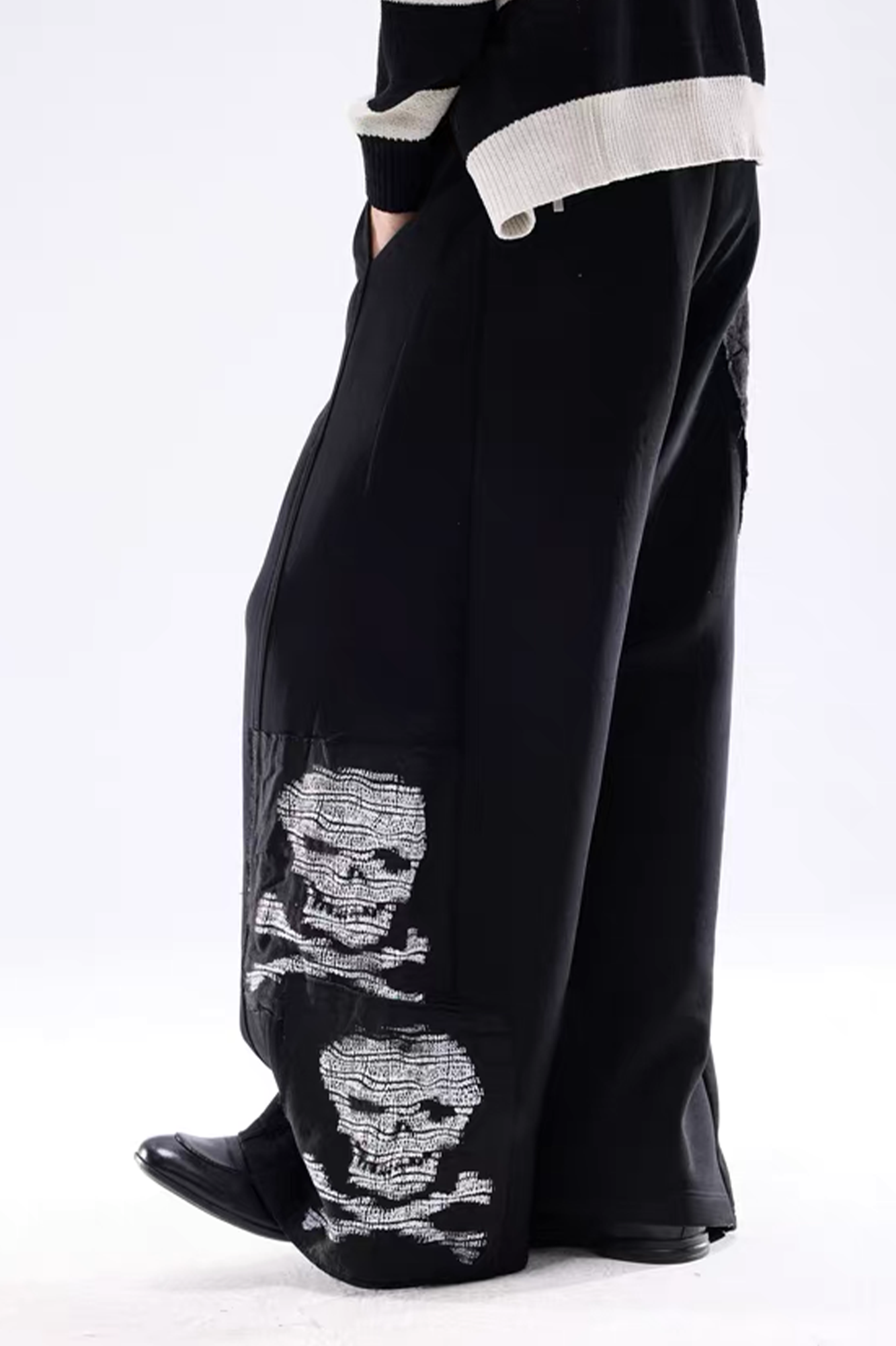 NOTHINGNESS WORLD Skull Graphic Wide-Leg Sweatpants, premium urban and streetwear designers apparel on PROJECTISR.com, NOTHINGNESS WORLD