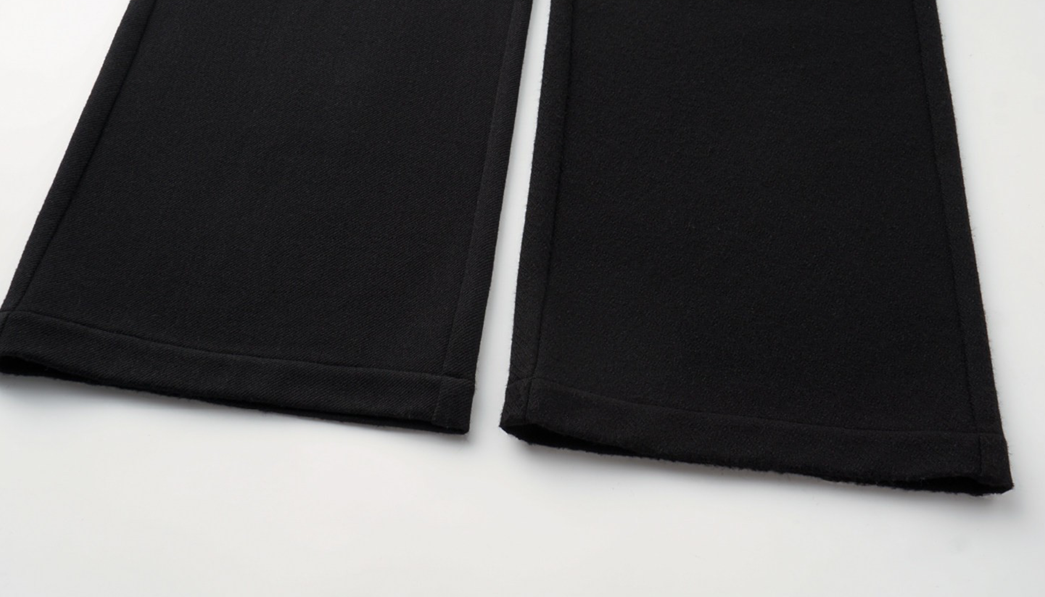 ALVNG AR ANTS Paneled Layered Wool-Blend Trousers