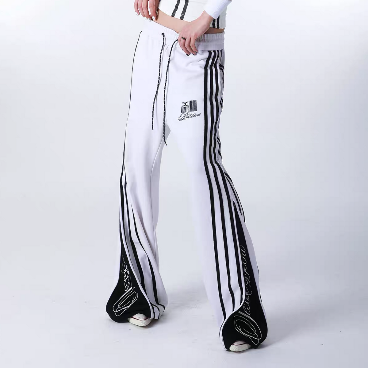 SEXXDEVIL Striped Deconstructed Zippered Embroidered Sweatpants
