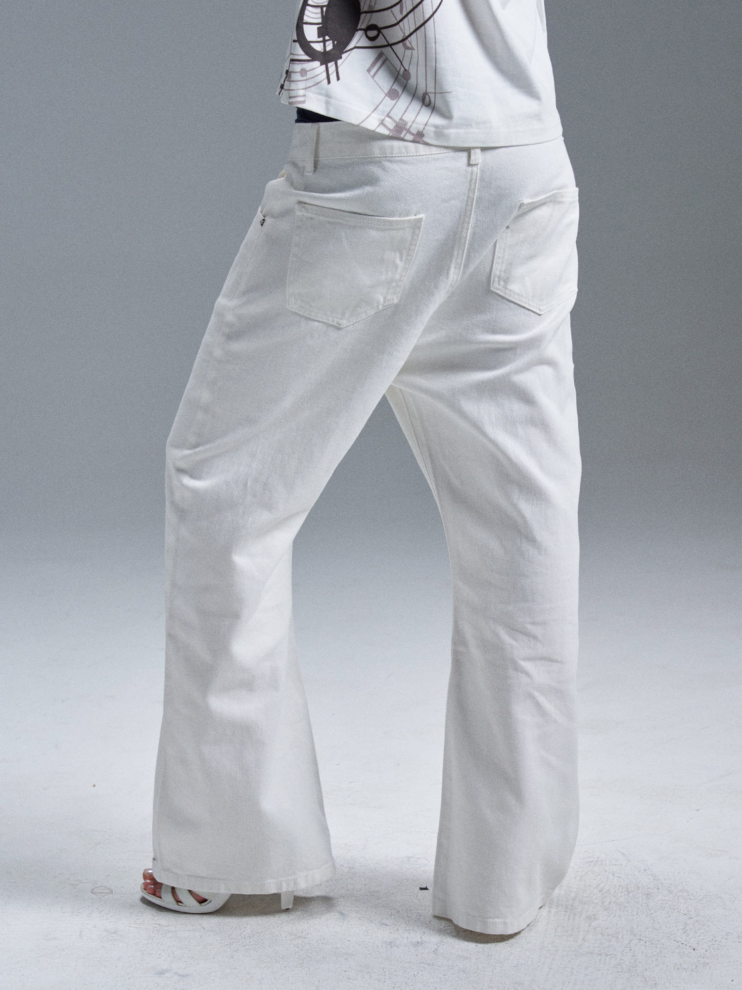 PAIKI Piano Key Script Foil Flared Jeans