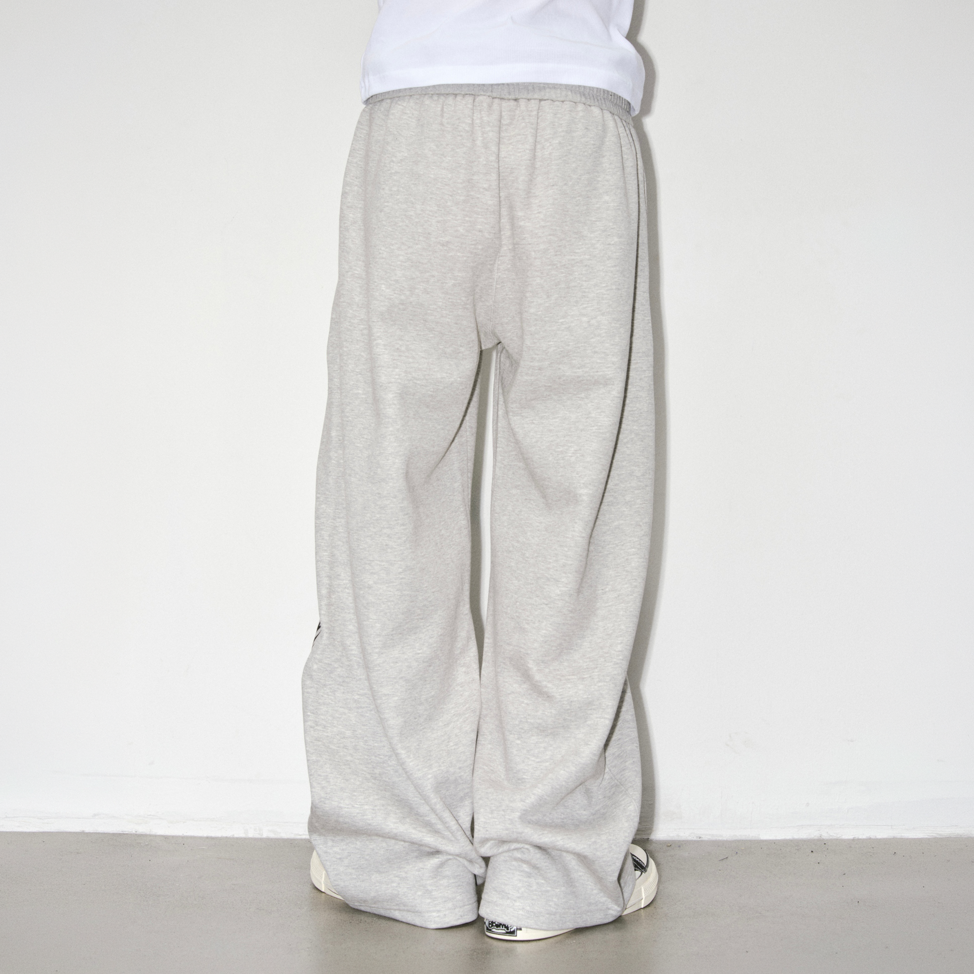 NOVACAM Portrait Graphic Curved Wide-Leg Sweatpants